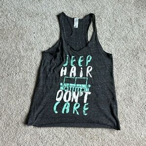 Alternative tank size M grayish black with white and mint green letters